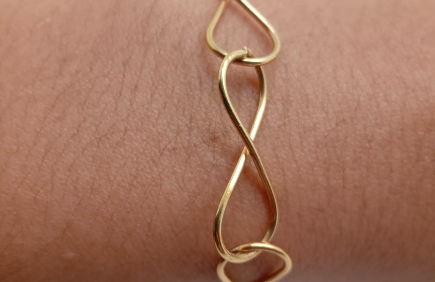 PULSEIRA INFINITO FOLHEADO A OURO 18K